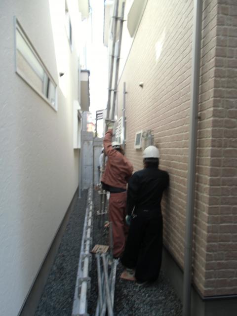 鳶職の専門職人チーム作業